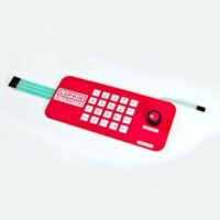 A red and white Duraswitch with a number pad and dial on the front from Marking Systems.