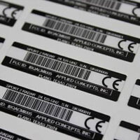 Barcodes in multiple lines and columns printed by label printing service at Marking Systems.