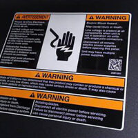 Front view of a warning label printed by info label printing services at Marking Systems.