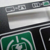 Close-up of a custom textured overlay made from Marking Systems’ overlay label printing services.
