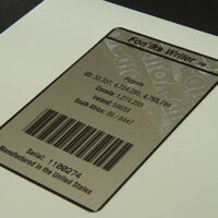 Front view of a tamper-evident label from label printing services at Marking Systems.